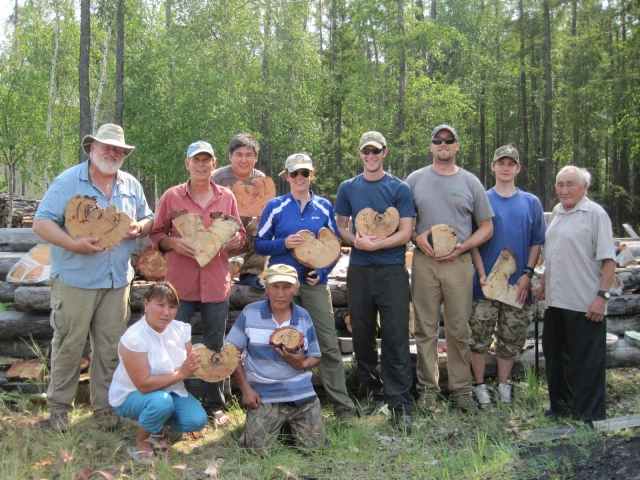 Group photo, holding cross-sections.