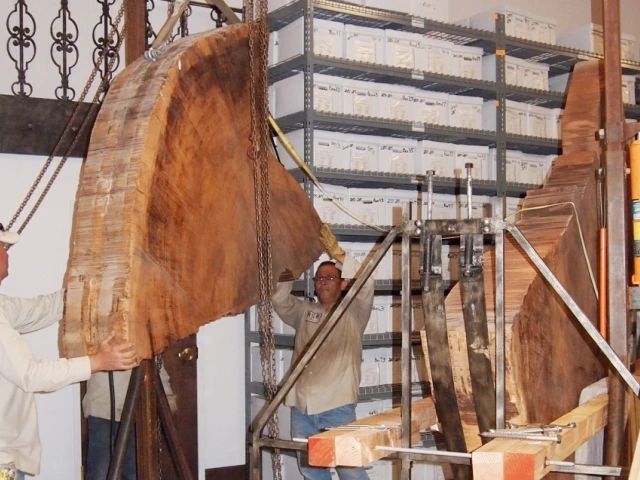 Riggers preparing the slab for moving.