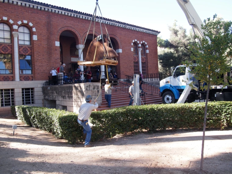 Large top section hanging from the crane